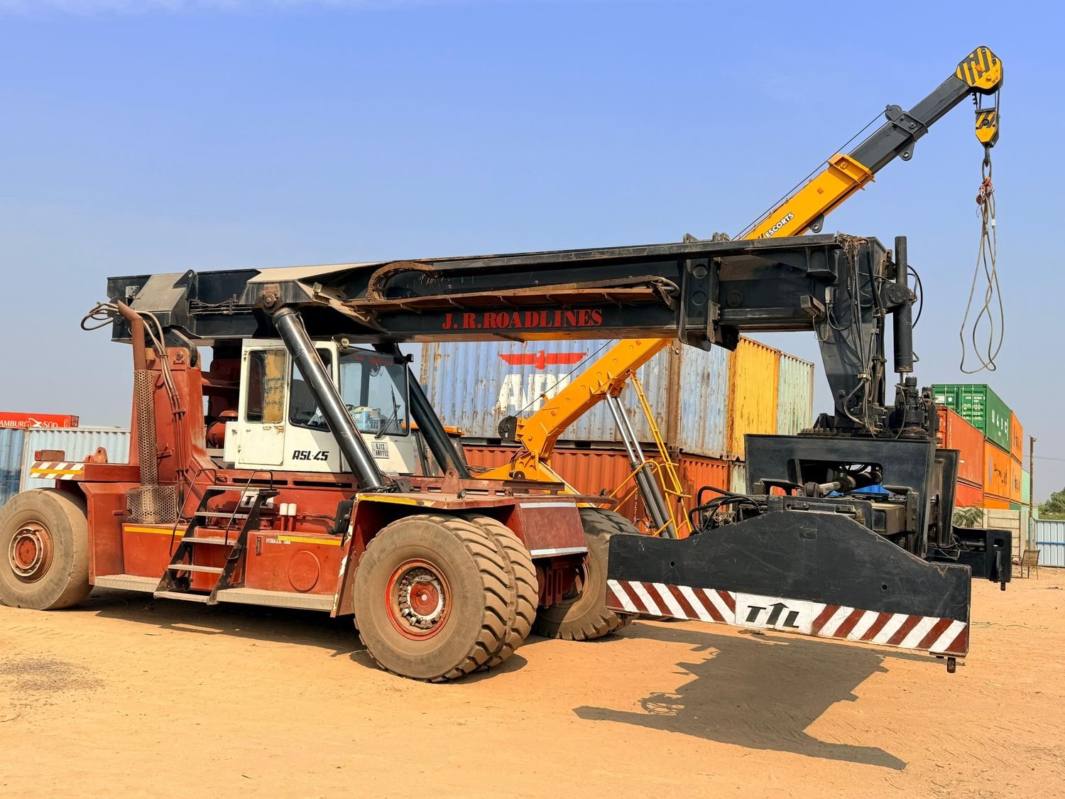 Container handling in the open yard